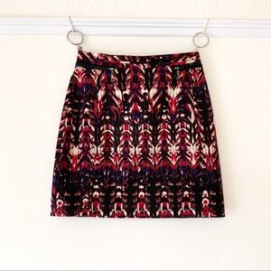 H&M dark abstract print mini skirt with faux leather trim